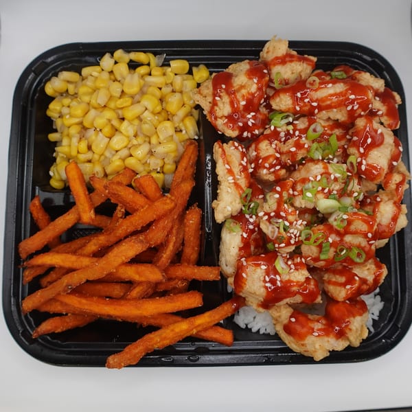 Nanabi Cafe's Asian meal with sweet and sour chicken, sweet potato fries, and corn.